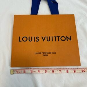 Authentic Louis Vuitton shopping bag. LV shopping bag.